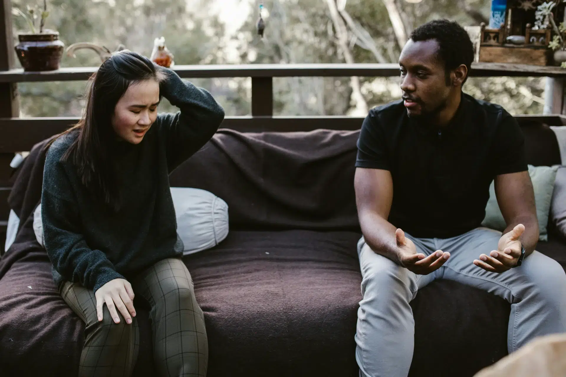 A man talking to a woman