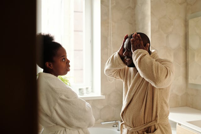 A couple in robes arguing