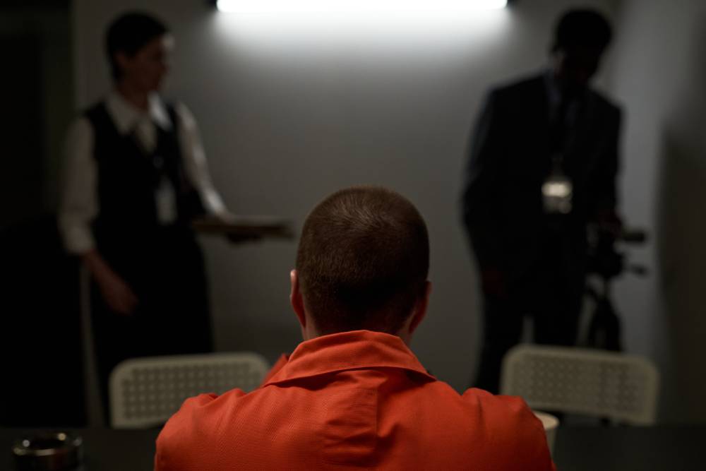 A sexual predator being interrogated by investigators