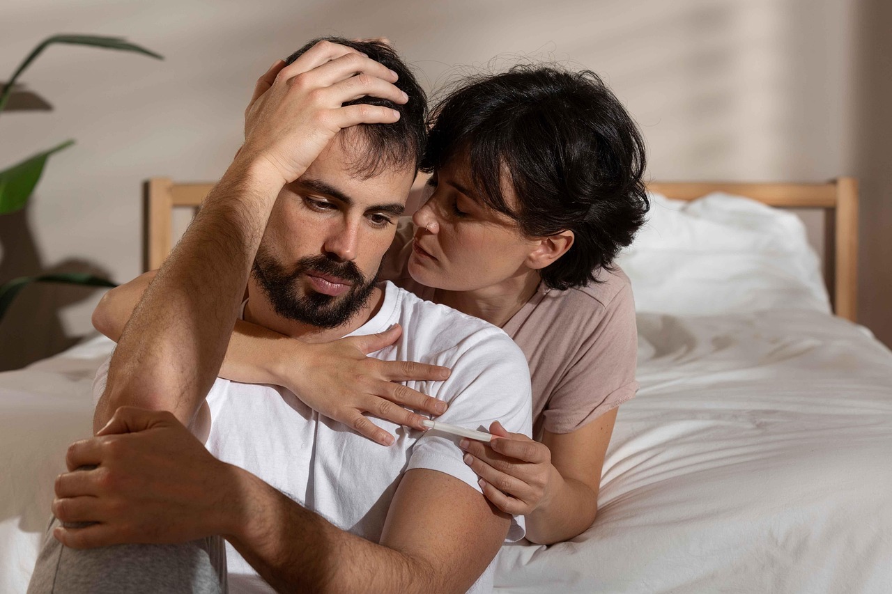 A woman tries to reassure her spouse after suspected infidelity